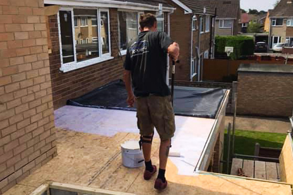 Ridgeline Roofing Doncaster carrying out work on a roof
